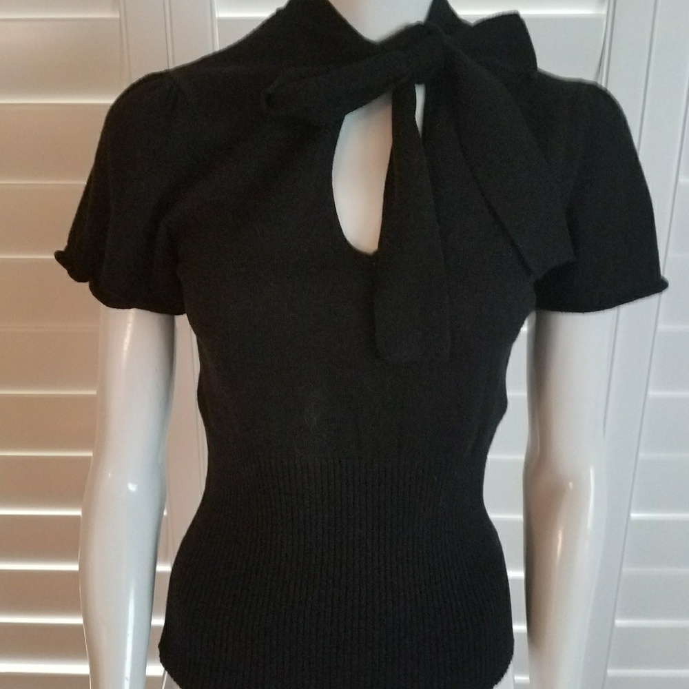 Lovely light weight short sleeve sweater.
